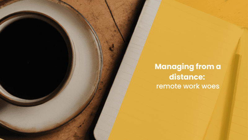 A close up image of a desk with coffee and notebook with the blog title "Managing from a distance, remote work woes"