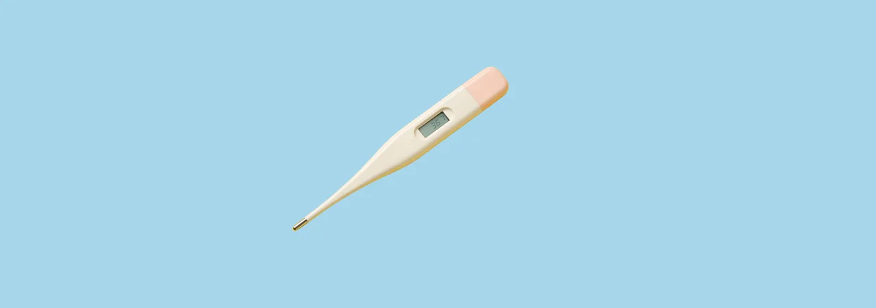 an image of a pink thermometer in front of a baby blue background